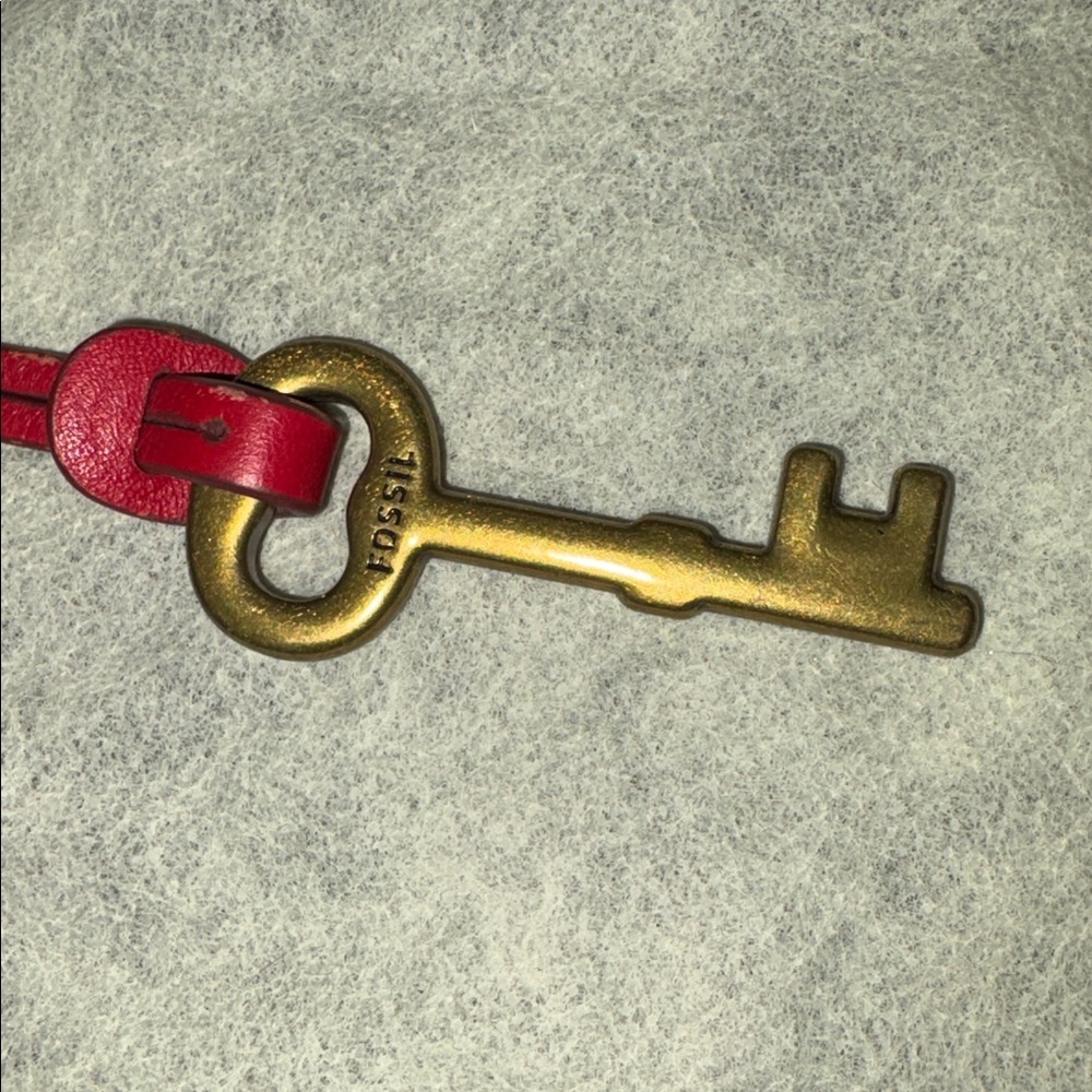 Fossil key with red leather strap